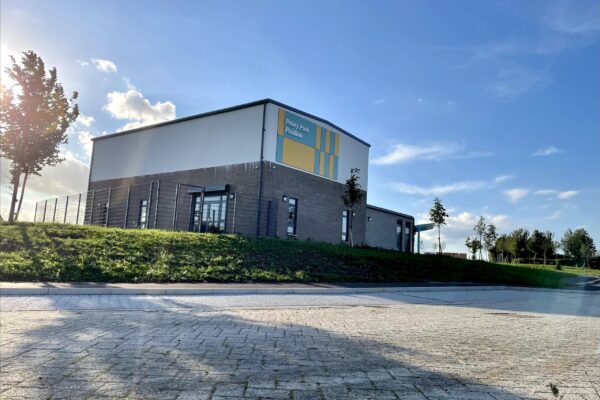 Priory Park Pavilion under a bright blue sky