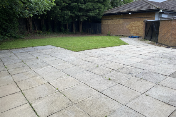 Exterior of partly paved garden of South Furzton Meeting Place